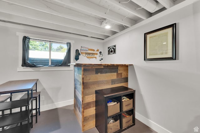 648 W 2200 N, Clinton, UT 84015 - bar with baseboards, finished concrete flooring, and beam ceiling