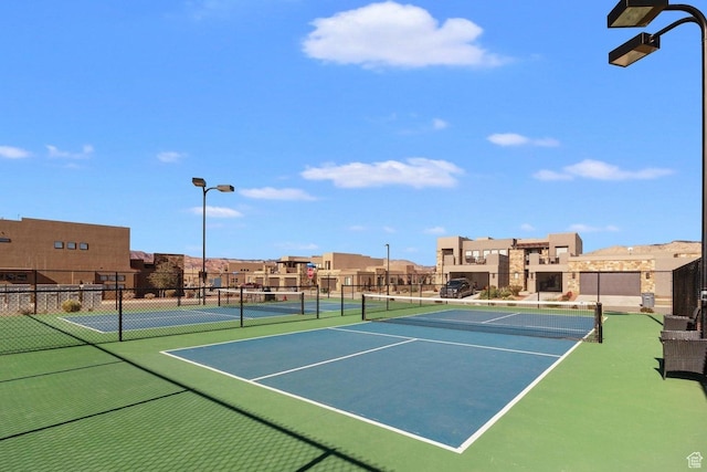 5048 N Escapes Dr, St George, UT 84770 - view of tennis court featuring a residential view and community basketball court