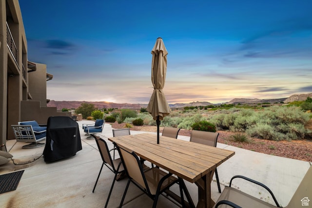 5048 N Escapes Dr, St George, UT 84770 - view of patio featuring outdoor dining space and a mountain view