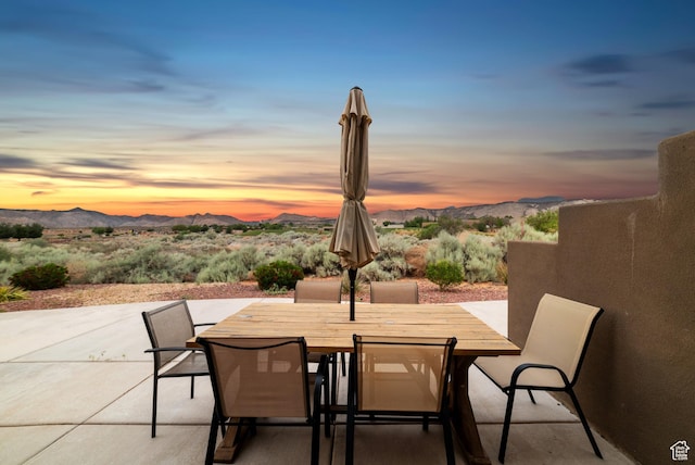5048 N Escapes Dr, St George, UT 84770 - view of patio featuring a mountain view and outdoor dining space