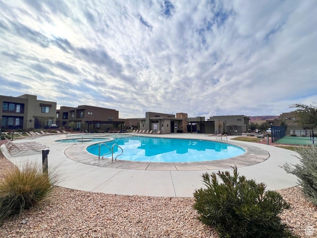 5048 N Escapes Dr, St George, UT 84770 - community pool featuring a residential view and a patio