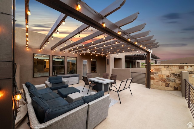5048 N Escapes Dr, St George, UT 84770 - patio terrace at dusk featuring an outdoor living space with a fire pit, a pergola, and a patio
