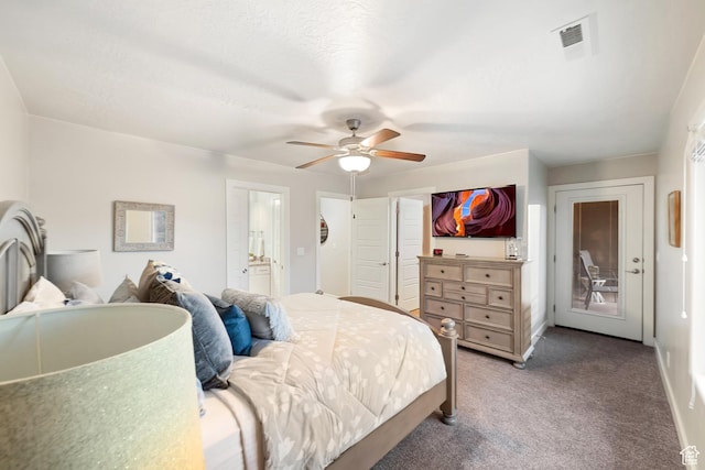 5048 N Escapes Dr, St George, UT 84770 - bedroom with carpet flooring, ceiling fan, ensuite bathroom, and baseboards