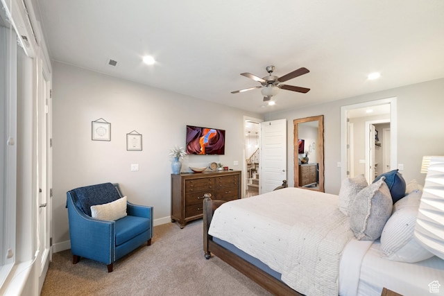 5048 N Escapes Dr, St George, UT 84770 - bedroom with recessed lighting, light carpet, baseboards, and ceiling fan