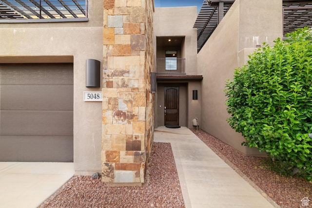 5048 N Escapes Dr, St George, UT 84770 - entrance to property featuring stucco siding