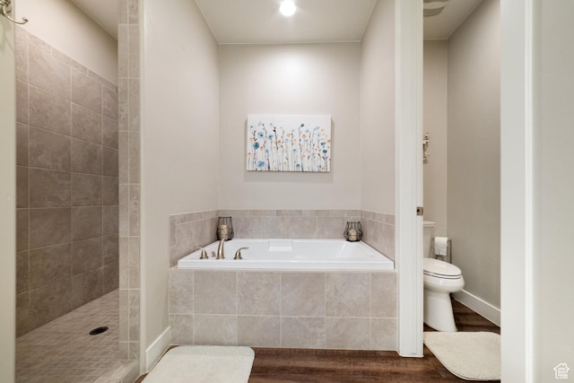 5048 N Escapes Dr, St George, UT 84770 - full bathroom featuring toilet, a garden tub, wood finished floors, and a tile shower