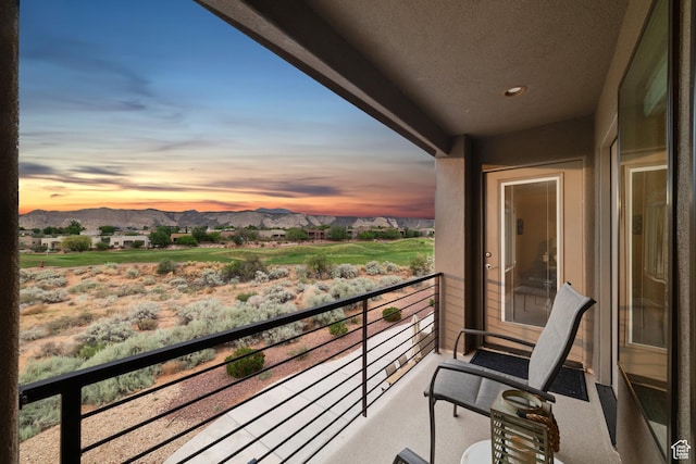 5048 N Escapes Dr, St George, UT 84770 - balcony at dusk featuring a mountain view