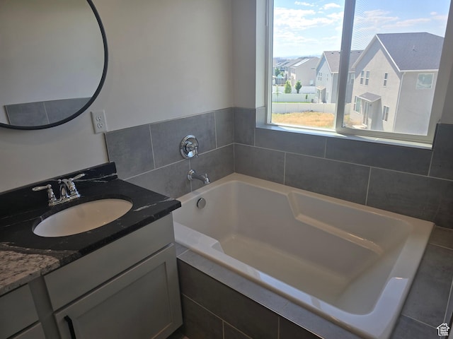 1573 N Woodside Dr, Spanish Fork, UT 84660 - bathroom featuring vanity and a garden tub