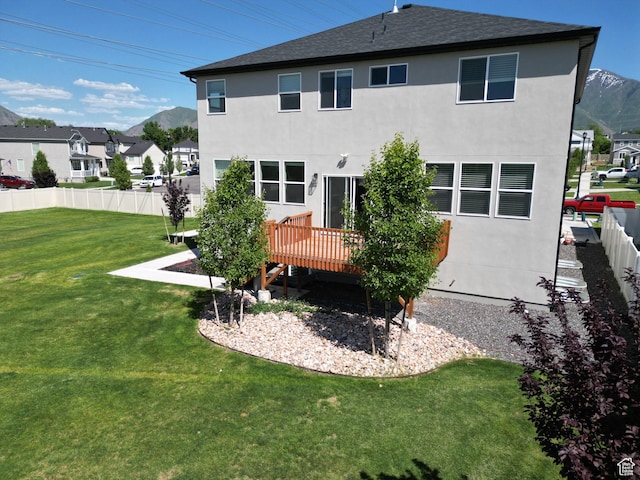 1573 N Woodside Dr, Spanish Fork, UT 84660 - rear view of house with a deck with mountain view and stucco siding