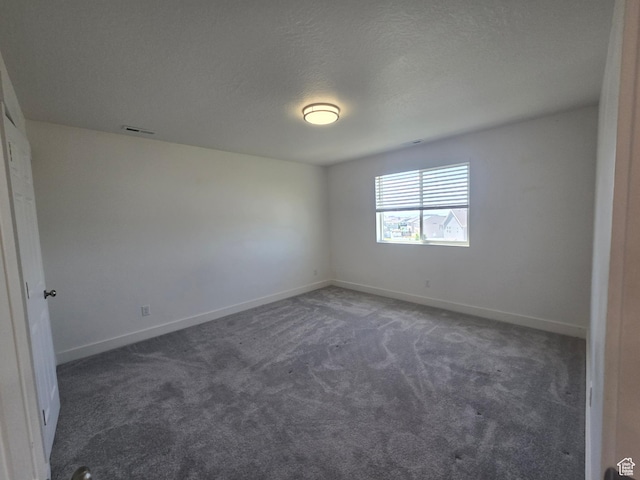 1573 N Woodside Dr, Spanish Fork, UT 84660 - unfurnished room featuring carpet floors, baseboards, and a textured ceiling