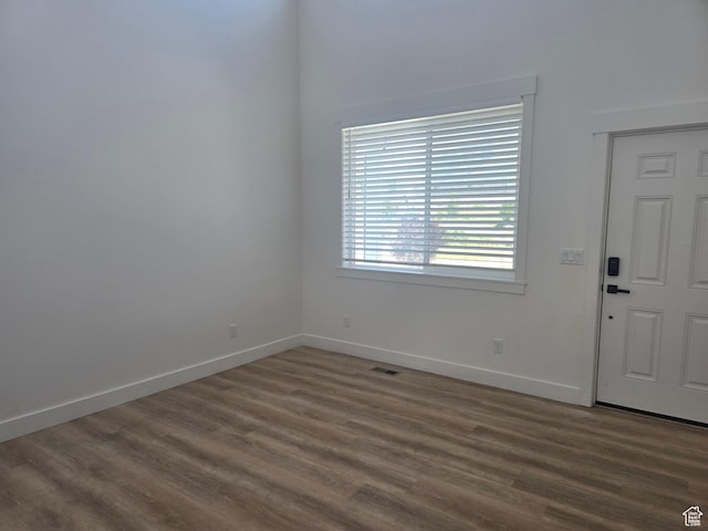 1573 N Woodside Dr, Spanish Fork, UT 84660 - unfurnished room with dark wood-style flooring and baseboards