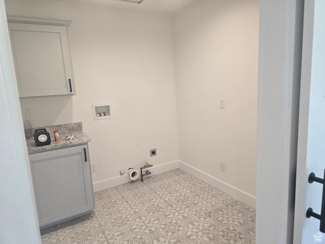 1573 N Woodside Dr, Spanish Fork, UT 84660 - washroom featuring gas dryer hookup, washer hookup, baseboards, electric dryer hookup, and cabinet space