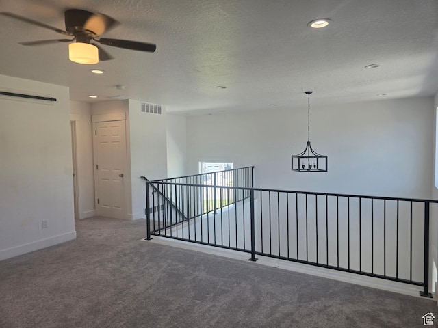 1573 N Woodside Dr, Spanish Fork, UT 84660 - carpeted empty room featuring baseboards, recessed lighting, a ceiling fan, a chandelier, and a textured ceiling