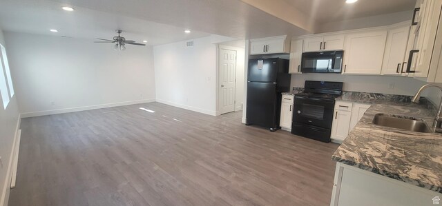 1573 N Woodside Dr, Spanish Fork, UT 84660 - kitchen featuring black appliances, a sink, ceiling fan, baseboards, and light wood finished floors