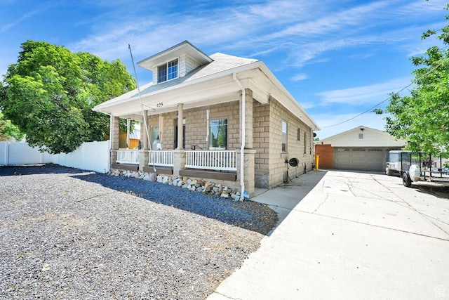 495 W 300 N, Clearfield, UT 84015 - view of front of home with a porch, an outbuilding, driveway, and a garage
