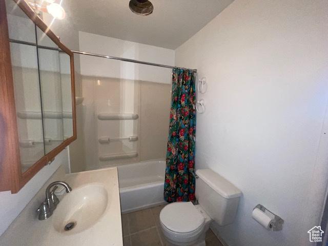 4562 S 785 E, Millcreek, UT 84107 - full bath with toilet, vanity, shower / bath combo, and tile patterned floors