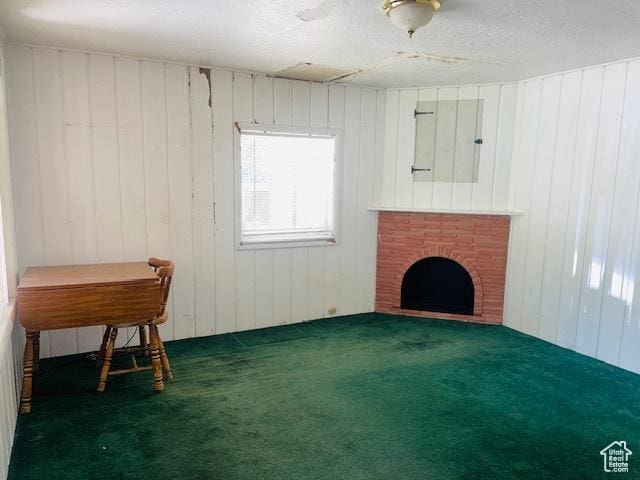 4562 S 785 E, Millcreek, UT 84107 - unfurnished living room with carpet flooring, a brick fireplace, and wood walls