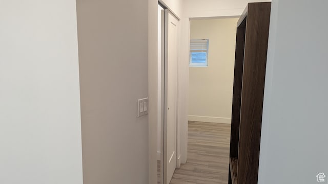 3065 S Brinker Ave, Ogden, UT 84403 - corridor featuring light wood finished floors and baseboards