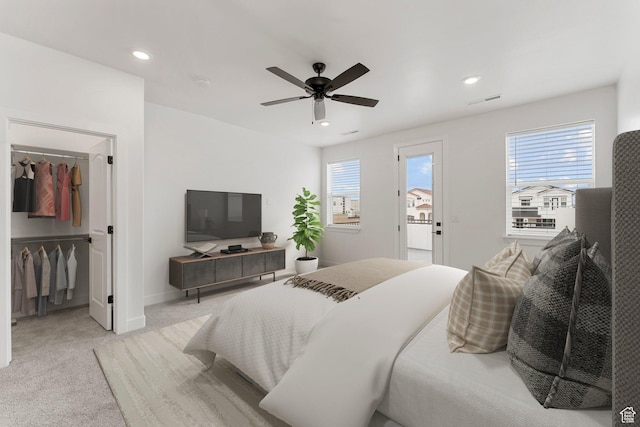 6134 S Kelly Ln, St George, UT 84790 - bedroom with light colored carpet, recessed lighting, ceiling fan, a spacious closet, and access to exterior