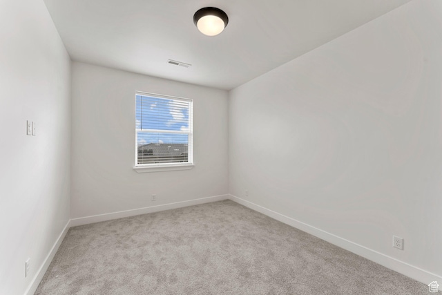 6134 S Kelly Ln, St George, UT 84790 - spare room featuring carpet flooring and baseboards