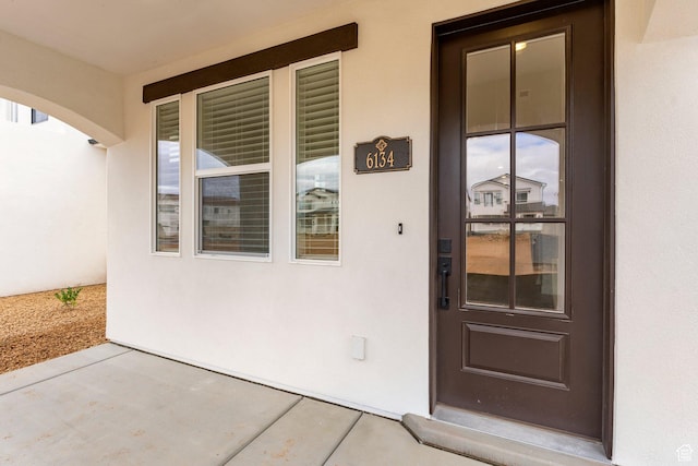 6134 S Kelly Ln, St George, UT 84790 - property entrance with stucco siding
