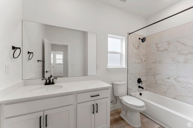 6134 S Kelly Ln, St George, UT 84790 - bathroom featuring toilet, vanity, shower / tub combination, and wood finished floors