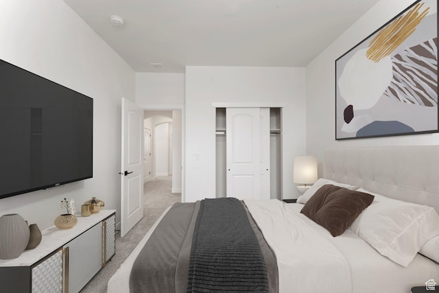 6134 S Kelly Ln, St George, UT 84790 - bedroom with light carpet, a closet, and arched walkways