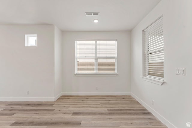 6134 S Kelly Ln, St George, UT 84790 - spare room featuring baseboards and light wood finished floors
