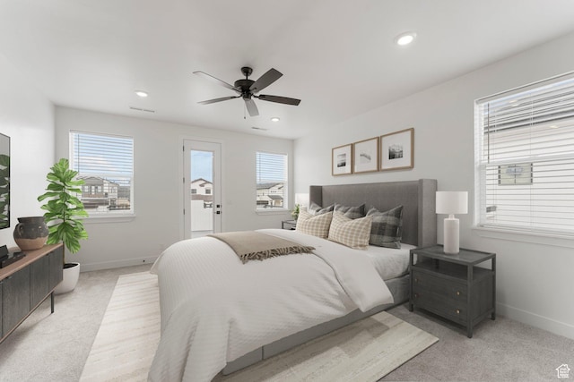 6134 S Kelly Ln, St George, UT 84790 - bedroom featuring multiple windows, light colored carpet, baseboards, access to exterior, and recessed lighting