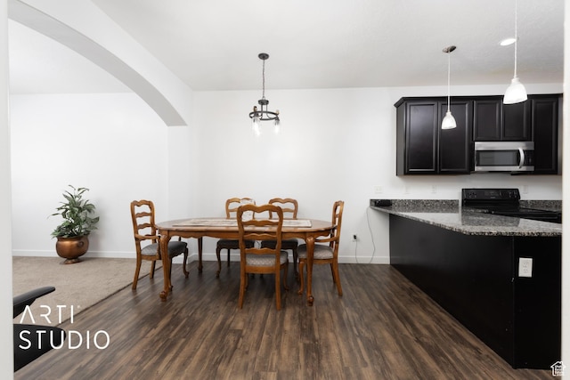 671 E 330 N, Vineyard, UT 84059 - dining room with arched walkways, baseboards, and dark wood-style flooring