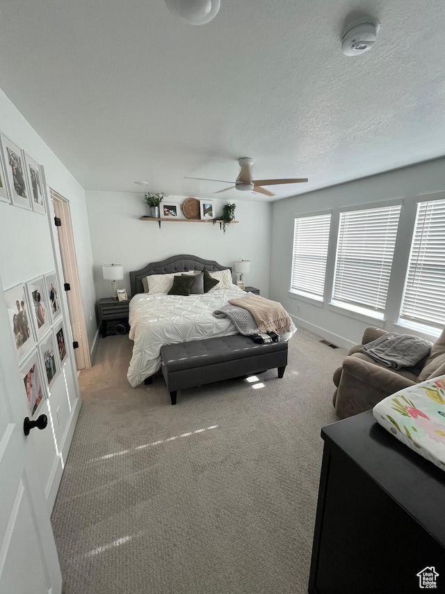 3198 N 3475 W, Plain City, UT 84404 - carpeted bedroom featuring baseboards and ceiling fan
