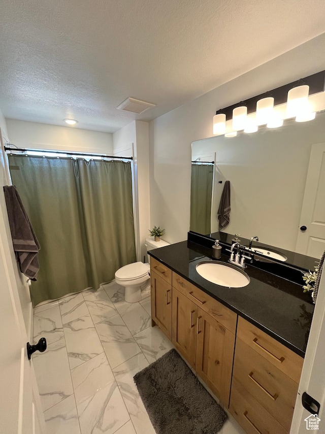 3198 N 3475 W, Plain City, UT 84404 - bathroom with marble look tile flooring, vanity, toilet, curtained shower, and a textured ceiling