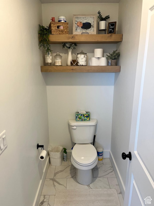 3198 N 3475 W, Plain City, UT 84404 - bathroom featuring marble finish floors, toilet, and baseboards