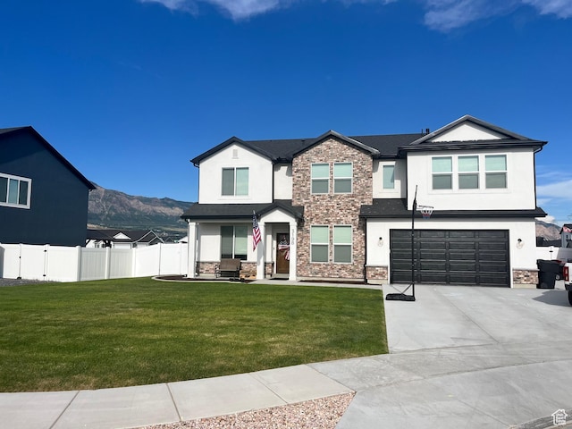 3198 N 3475 W, Plain City, UT 84404 - view of front facade with stucco siding, stone siding, an attached garage, and concrete driveway