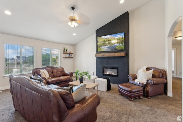 261 W 1200 S, Lehi, UT 84043 - living room with lofted ceiling, carpet floors, arched walkways, a fireplace, and ceiling fan