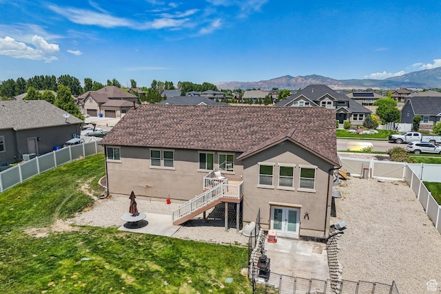 261 W 1200 S, Lehi, UT 84043 - back of property featuring a residential view, a patio area, stucco siding, and a gate