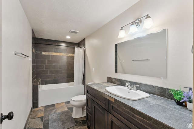 261 W 1200 S, Lehi, UT 84043 - full bathroom with vanity, toilet, stone finish floors, and shower / bath combination with curtain