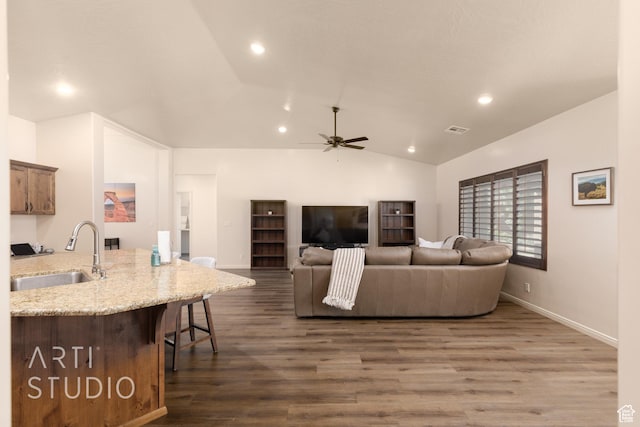 3504 E 3140 S, St George, UT 84790 - living room featuring lofted ceiling, dark wood-style flooring, recessed lighting, ceiling fan, and baseboards
