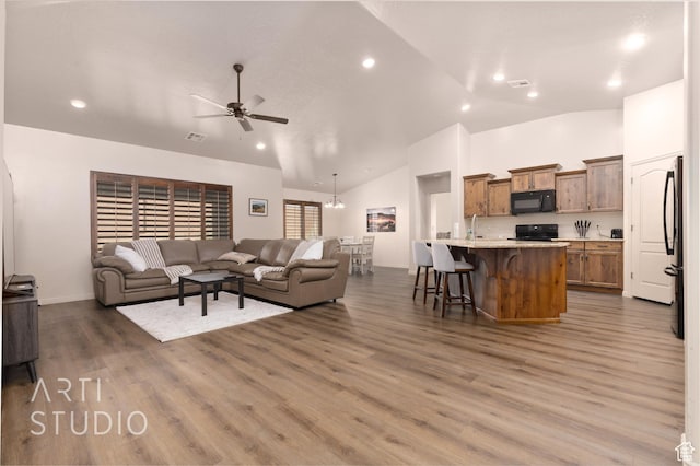 3504 E 3140 S, St George, UT 84790 - living area featuring a ceiling fan, high vaulted ceiling, wood finished floors, baseboards, and recessed lighting