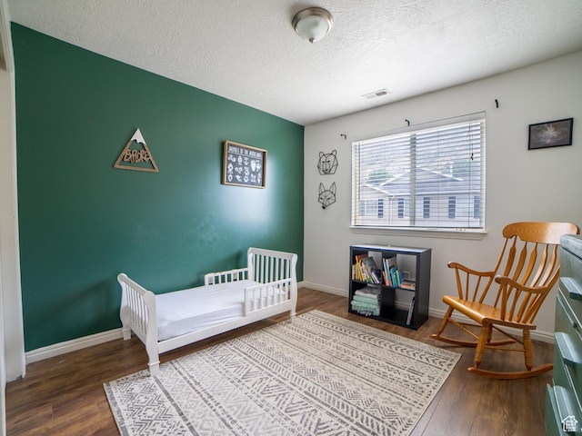 1305 S 1410 E, Provo, UT 84606 - bedroom with wood finished floors, a textured ceiling, and baseboards