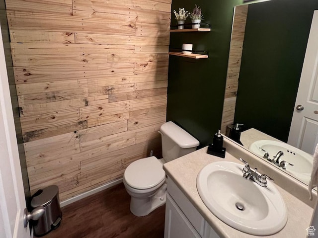 1305 S 1410 E, Provo, UT 84606 - bathroom with toilet, wood finished floors, vanity, wooden walls, and baseboards