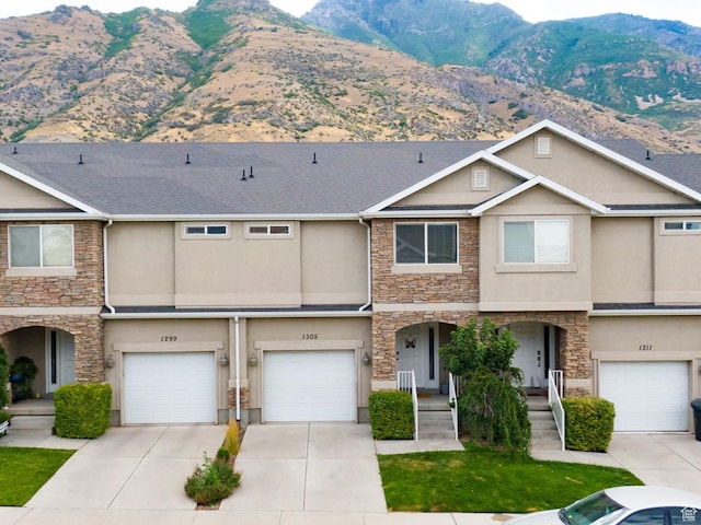 1305 S 1410 E, Provo, UT 84606 - multi unit property featuring stone siding, stucco siding, a mountain view, and an attached garage