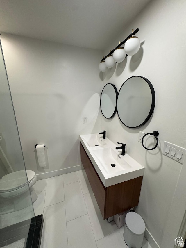 4288 S Shirley Ln, Holladay, UT 84124 - bathroom with toilet, double vanity, and baseboards