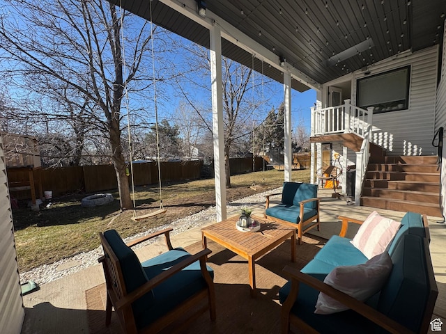 4288 S Shirley Ln, Holladay, UT 84124 - fenced backyard with an outdoor living space with a fire pit and a patio