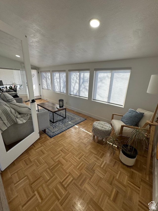 4288 S Shirley Ln, Holladay, UT 84124 - living room featuring a textured ceiling, baseboards, and recessed lighting