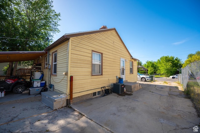 1457 W 700 S, Salt Lake City, UT 84104 - view of property exterior featuring a chimney and cooling unit