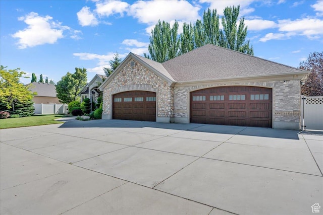10605 S Willow Valley Rd W, South Jordan, UT 84095 - french provincial home featuring concrete driveway, a garage, and brick siding