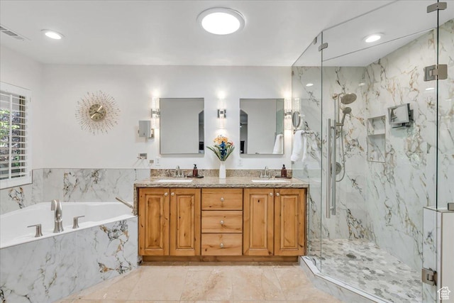 10605 S Willow Valley Rd W, South Jordan, UT 84095 - bathroom with a bath, a marble finish shower, double vanity, marble finish floors, and recessed lighting