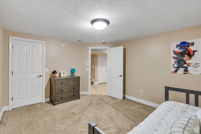 10605 S Willow Valley Rd W, South Jordan, UT 84095 - bedroom with a textured ceiling, light colored carpet, and baseboards