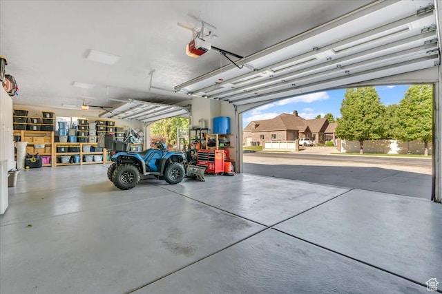 10605 S Willow Valley Rd W, South Jordan, UT 84095 - garage featuring a garage door opener